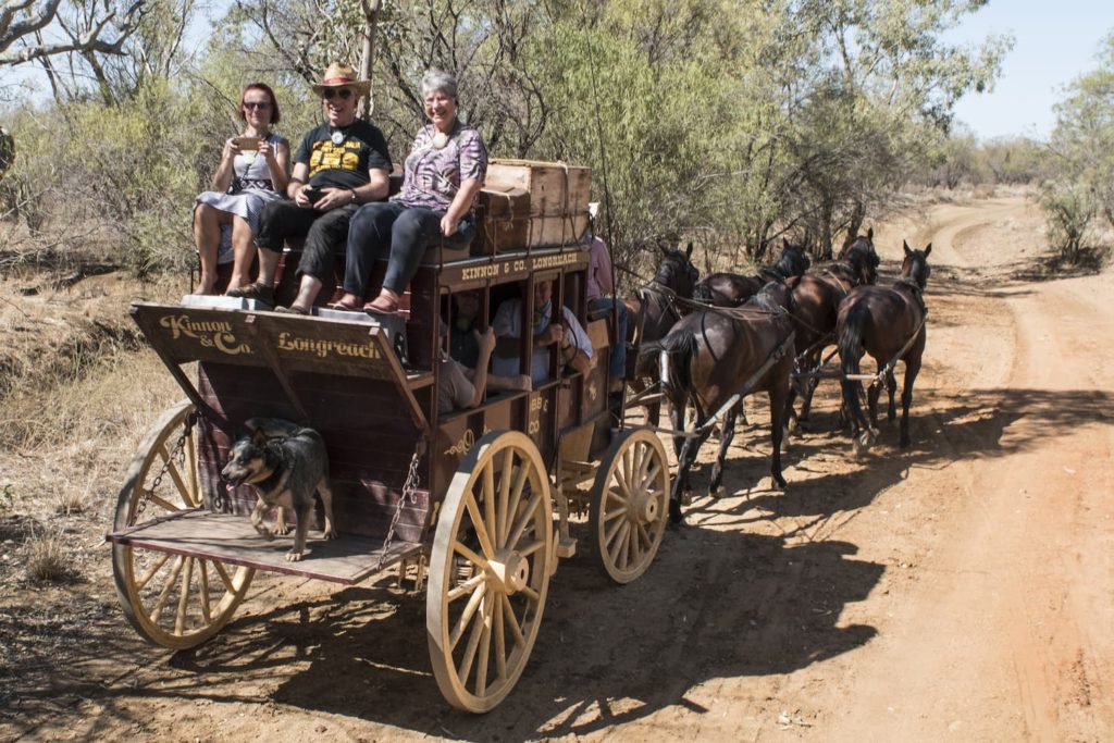 Guests enjoying a ride atop the Cobb and Co stagecoach