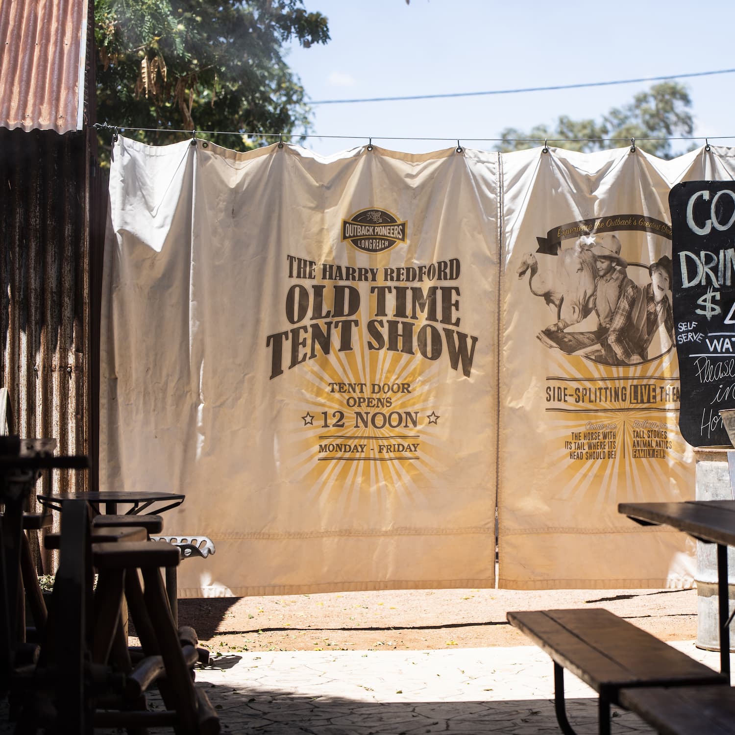 Old Time Tent Show canvas curtains pulled closed, waiting for the performance to start