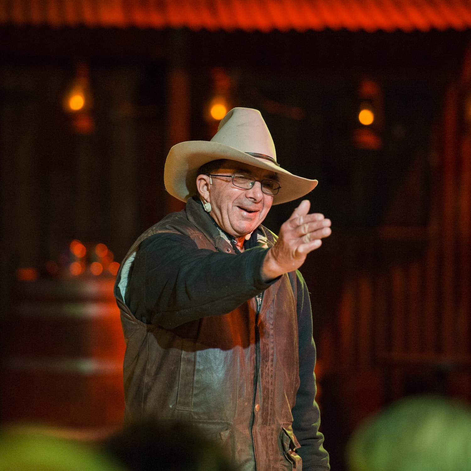 Scotty, the bare foot bush poet entertaining guests at the river camp