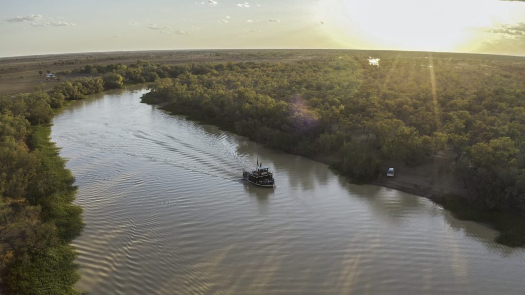 A bird's-eye view of the Thomson Belle cruising on the river
