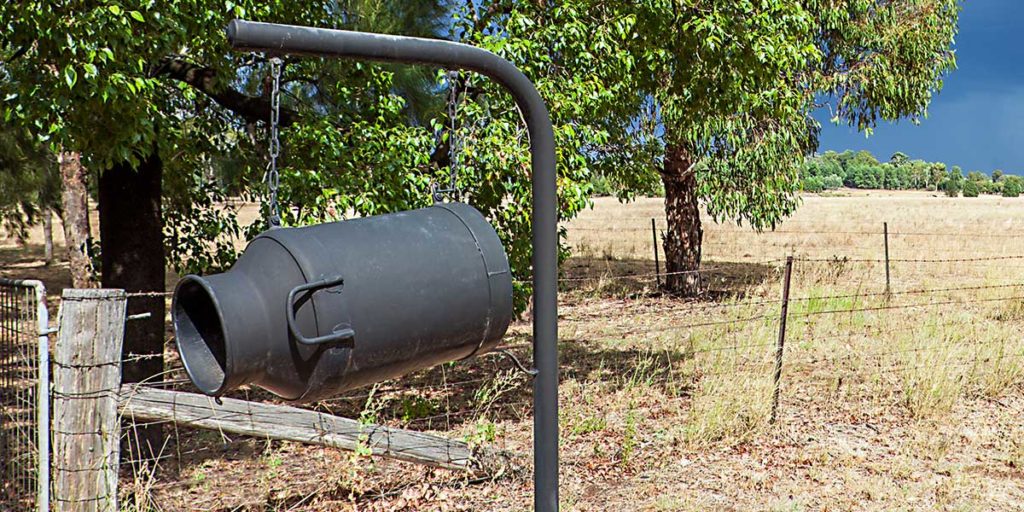 A letterbox made from a reused metal jug