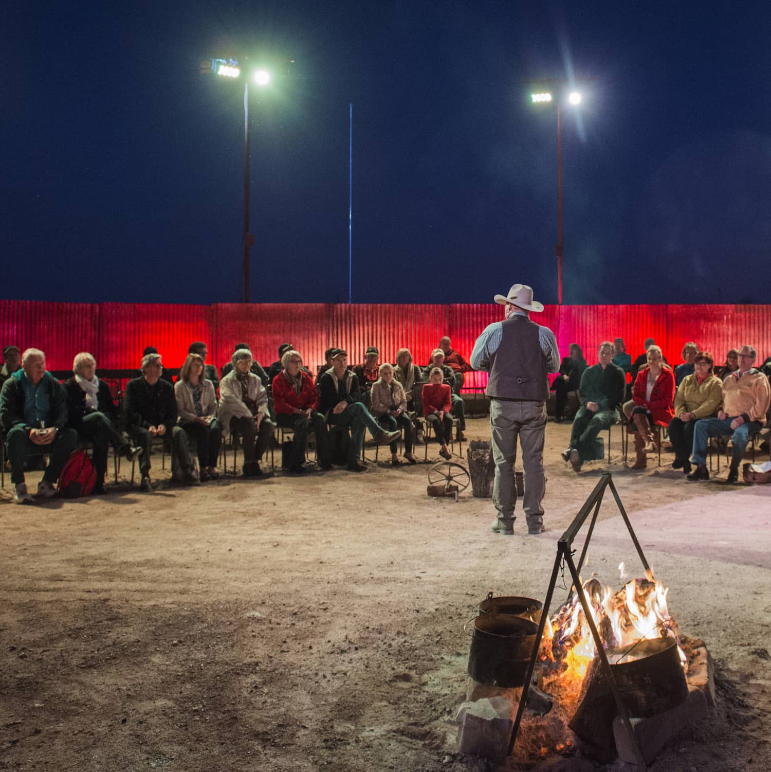 Outback Pioneers guests sitting around a campfire