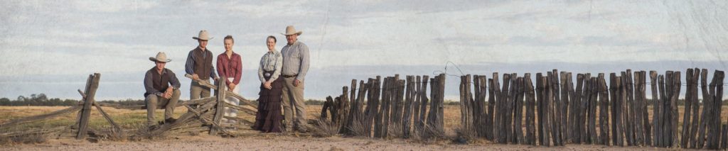 The Kinnon family pose in the outback