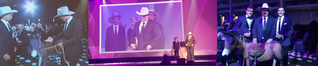 Richard Kinnon and family accepting the gold award for Cultural Tourism