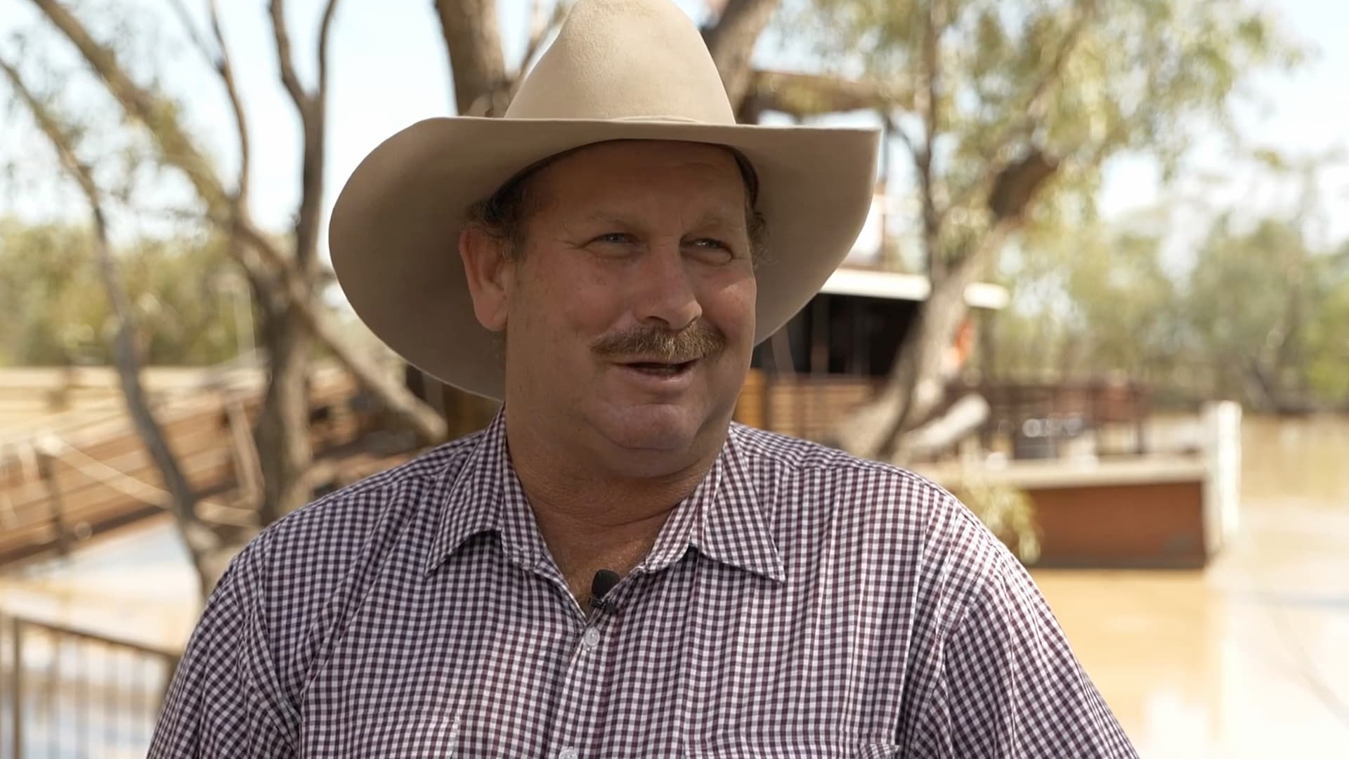 Close-up of Richard Kinnon standing on a riverbank