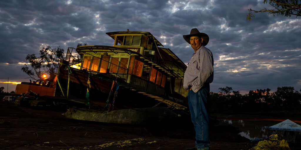 Pride of the Murray paddlewheeler with Richard Kinnon looking on the salvage project